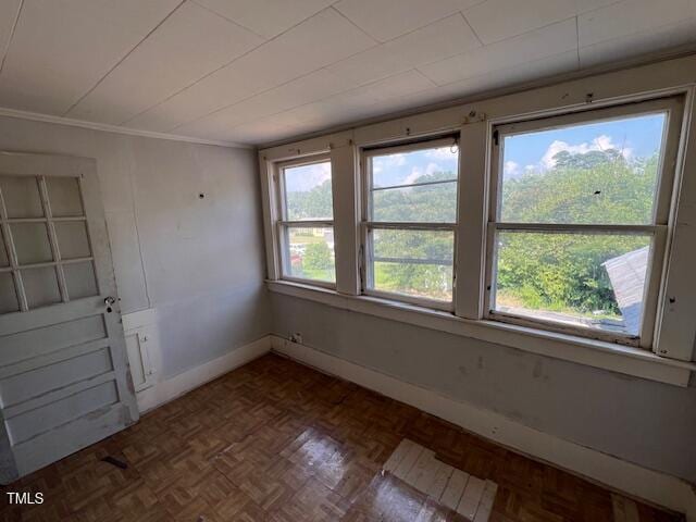 401 Division St, Norlina, NC 27563 - spare room featuring baseboards and ornamental molding