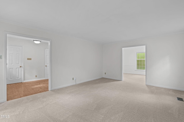 5313 Falkirk Dr, Durham, NC 27712 - carpeted empty room with baseboards