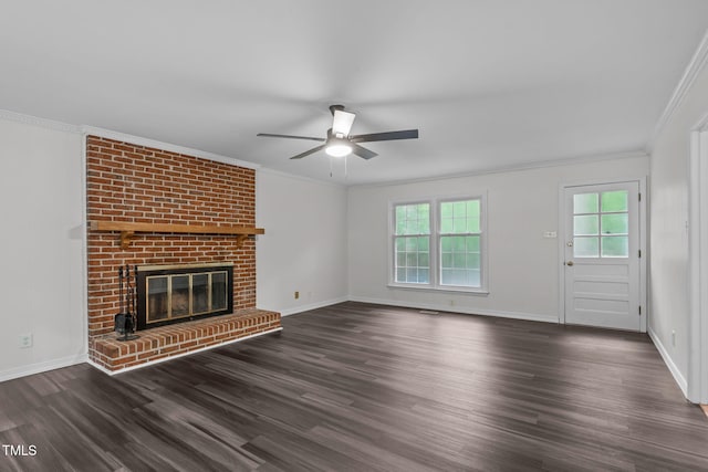 5313 Falkirk Dr, Durham, NC 27712 - unfurnished living room with wood finished floors, ceiling fan, ornamental molding, and a brick fireplace