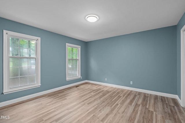 5313 Falkirk Dr, Durham, NC 27712 - empty room with light wood-type flooring and baseboards
