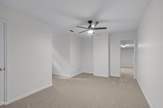 5313 Falkirk Dr, Durham, NC 27712 - spare room with light colored carpet and a ceiling fan