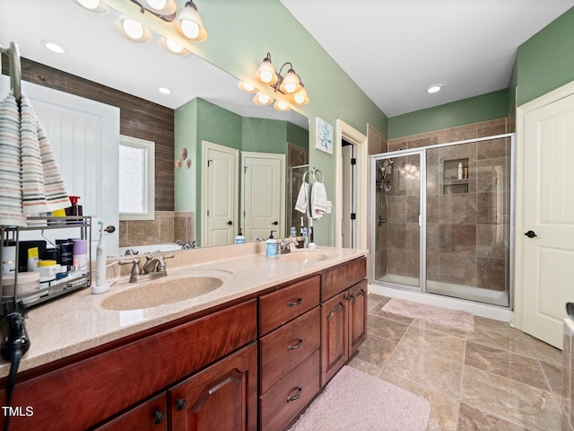 171 Winding Oak Way, Clayton, NC 27520 - bathroom featuring a stall shower, double vanity, and a garden tub