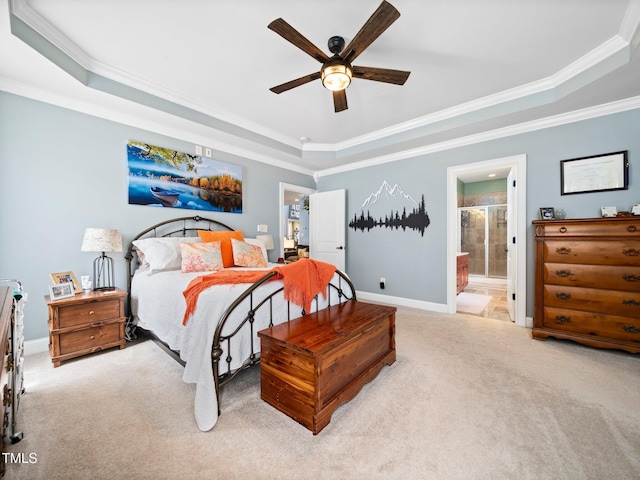 171 Winding Oak Way, Clayton, NC 27520 - bedroom with a raised ceiling, carpet, ornamental molding, ensuite bath, and ceiling fan