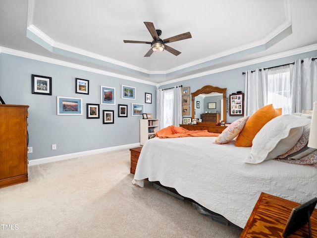 171 Winding Oak Way, Clayton, NC 27520 - bedroom featuring a raised ceiling, multiple windows, crown molding, light colored carpet, and ceiling fan