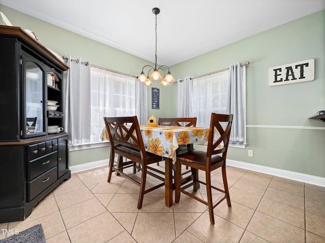 171 Winding Oak Way, Clayton, NC 27520 - dining room with healthy amount of natural light, a chandelier, and light tile patterned floors