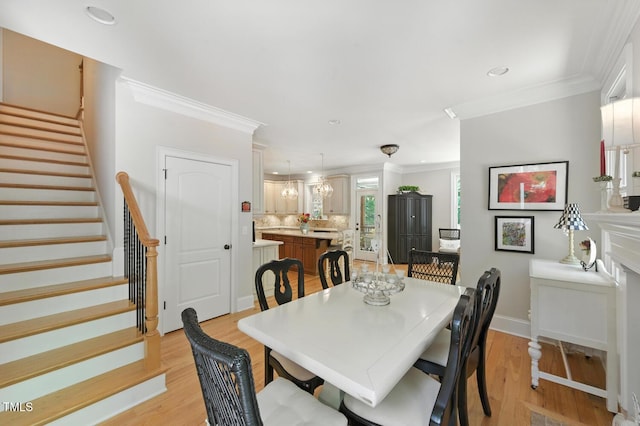 137 Forked Pine Ct, Chapel Hill, NC 27517 - dining room featuring stairs, light wood-style floors, ornamental molding, and recessed lighting