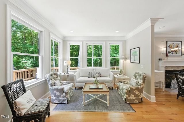 137 Forked Pine Ct, Chapel Hill, NC 27517 - living room with wood finished floors, crown molding, a glass covered fireplace, and recessed lighting