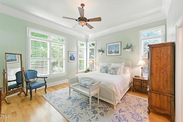 137 Forked Pine Ct, Chapel Hill, NC 27517 - bedroom with multiple windows, light wood-style flooring, crown molding, and ceiling fan