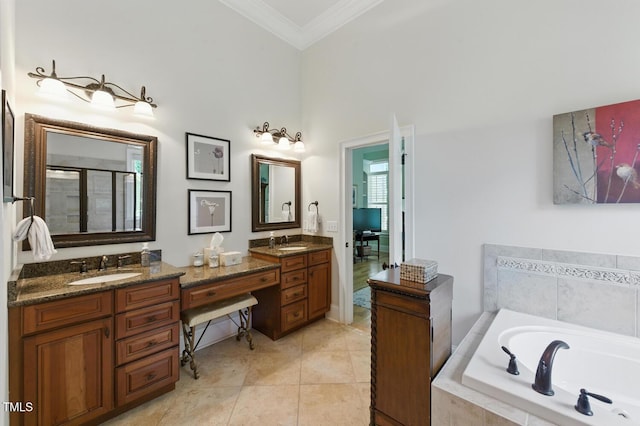 137 Forked Pine Ct, Chapel Hill, NC 27517 - bathroom featuring double vanity, crown molding, a garden tub, a stall shower, and tile patterned floors
