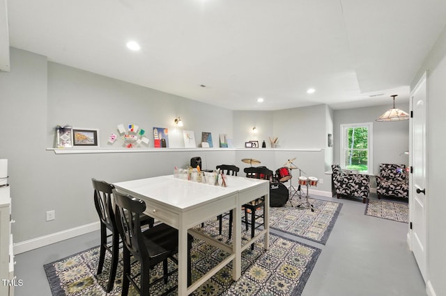 137 Forked Pine Ct, Chapel Hill, NC 27517 - dining room with finished concrete floors and recessed lighting