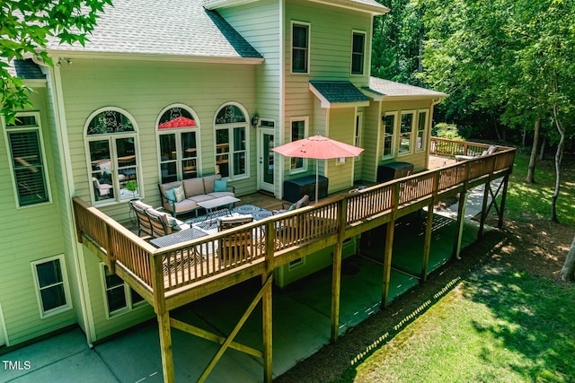 137 Forked Pine Ct, Chapel Hill, NC 27517 - back of property featuring a deck, a shingled roof, and an outdoor hangout area
