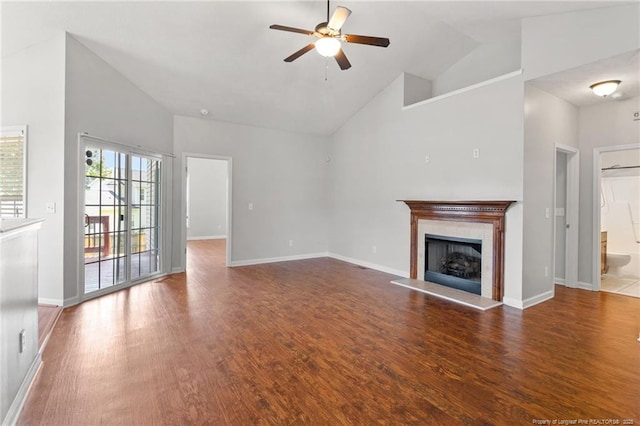 1605 Stanford Ct, Fayetteville, NC 28314 - unfurnished living room with high vaulted ceiling, a ceiling fan, wood finished floors, and a fireplace with raised hearth