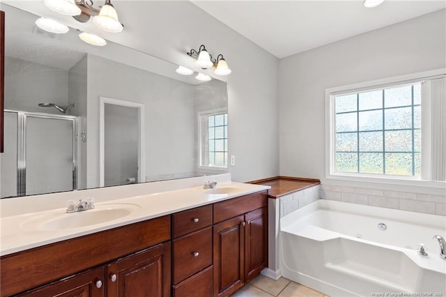 1605 Stanford Ct, Fayetteville, NC 28314 - full bathroom with healthy amount of natural light, a stall shower, double vanity, and a whirlpool tub