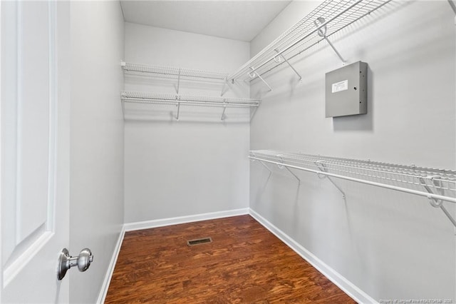 1605 Stanford Ct, Fayetteville, NC 28314 - spacious closet featuring dark wood-style floors