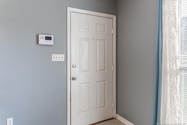 4105 Freedom Ln, Hope Mills, NC 28348 - entryway featuring light tile patterned floors and baseboards