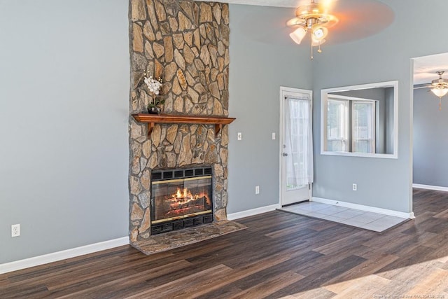 4105 Freedom Ln, Hope Mills, NC 28348 - unfurnished living room with ceiling fan, heating unit, wood finished floors, and a fireplace