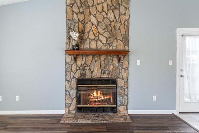 4105 Freedom Ln, Hope Mills, NC 28348 - detailed view of a stone fireplace and wood finished floors