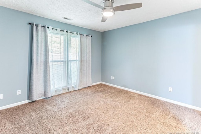 4105 Freedom Ln, Hope Mills, NC 28348 - carpeted empty room featuring a ceiling fan and a textured ceiling