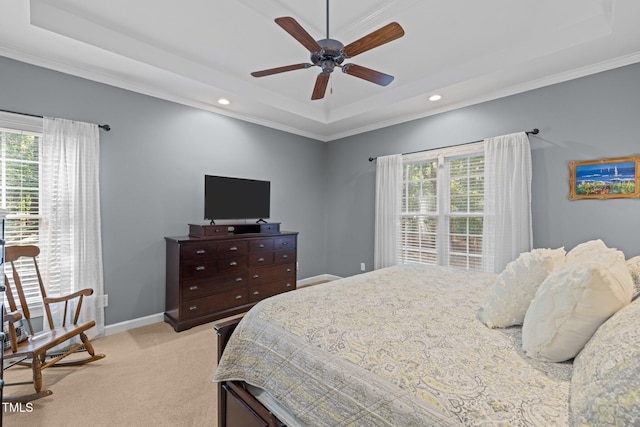 3608 Smoky Chestnut Ln, Raleigh, NC 27615 - bedroom with a tray ceiling, multiple windows, light colored carpet, recessed lighting, and crown molding