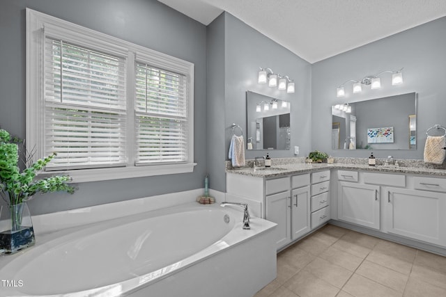 3608 Smoky Chestnut Ln, Raleigh, NC 27615 - bathroom featuring vanity, tile patterned flooring, and a bath