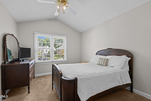 3608 Smoky Chestnut Ln, Raleigh, NC 27615 - bedroom with light carpet, a ceiling fan, a textured ceiling, and vaulted ceiling