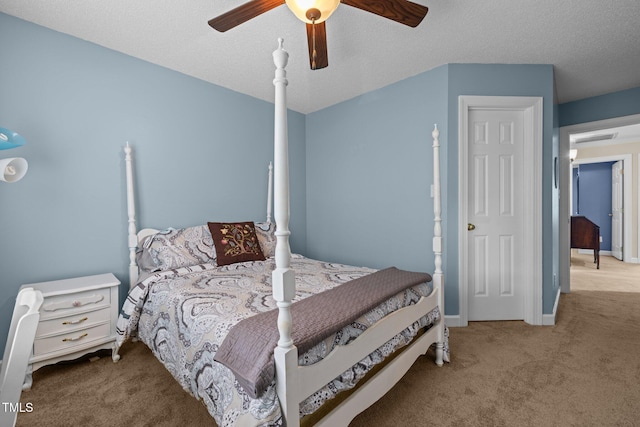 3608 Smoky Chestnut Ln, Raleigh, NC 27615 - bedroom with carpet floors, ceiling fan, and a textured ceiling