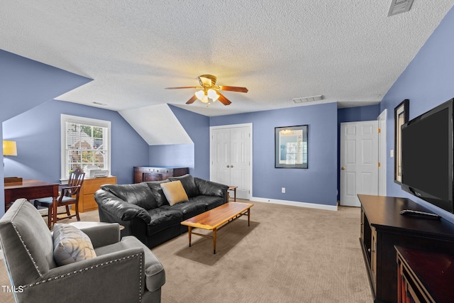 3608 Smoky Chestnut Ln, Raleigh, NC 27615 - living room with a ceiling fan, light colored carpet, a textured ceiling, and vaulted ceiling