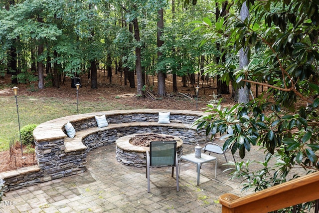 3608 Smoky Chestnut Ln, Raleigh, NC 27615 - view of patio with an outdoor fire pit
