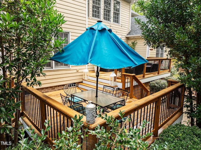3608 Smoky Chestnut Ln, Raleigh, NC 27615 - wooden deck featuring outdoor dining area and stairway