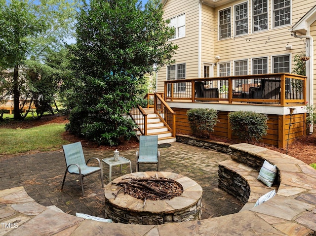3608 Smoky Chestnut Ln, Raleigh, NC 27615 - view of patio / terrace featuring stairway, a fire pit, and a wooden deck