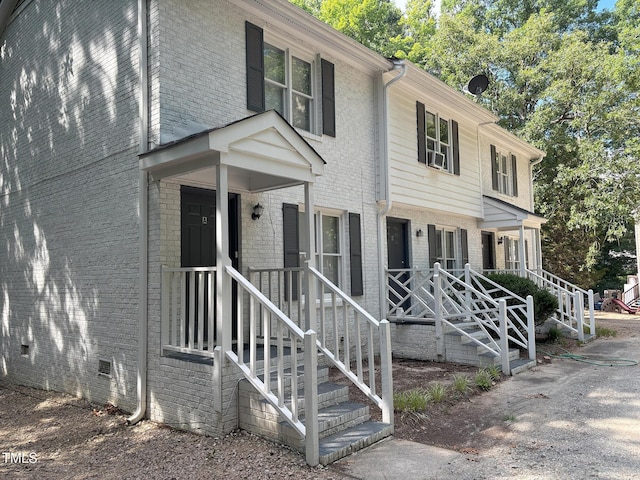1405 Highview Ct, Raleigh, NC 27606 - view of front of home with brick siding and crawl space