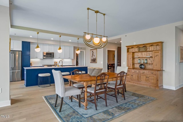 214 Hunt St Unit 503, Durham, NC 27701 - dining area with light wood-style flooring and recessed lighting