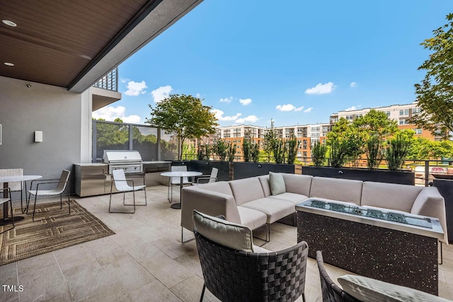 214 Hunt St Unit 503, Durham, NC 27701 - view of patio featuring an outdoor living space with a fire pit and area for grilling