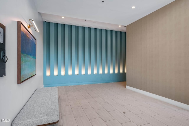 214 Hunt St Unit 503, Durham, NC 27701 - spare room with wallpapered walls and recessed lighting