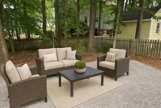 112 W Skyhawk Dr, Cary, NC 27519 - fenced backyard with outdoor lounge area and a patio