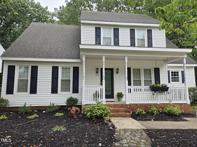 112 W Skyhawk Dr, Cary, NC 27519 - view of front of house with covered porch, a shingled roof, and crawl space