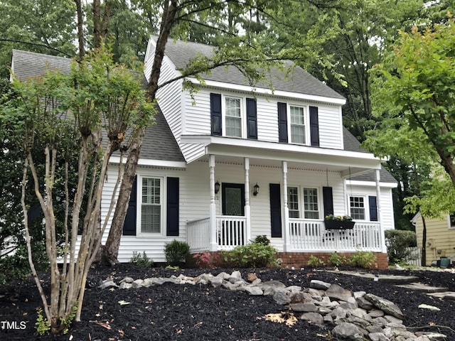 112 W Skyhawk Dr, Cary, NC 27519 - view of front of home featuring a porch and roof with shingles