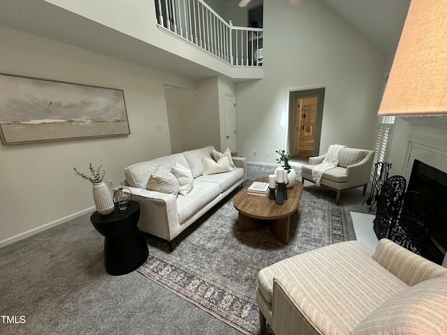 112 W Skyhawk Dr, Cary, NC 27519 - carpeted living room featuring high vaulted ceiling and a fireplace