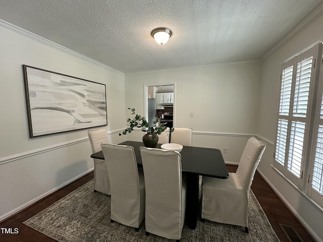 112 W Skyhawk Dr, Cary, NC 27519 - dining area with a textured ceiling, plenty of natural light, wood finished floors, and ornamental molding