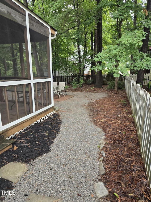 112 W Skyhawk Dr, Cary, NC 27519 - fenced backyard featuring a sunroom
