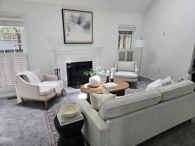 112 W Skyhawk Dr, Cary, NC 27519 - carpeted living room with plenty of natural light and a fireplace with flush hearth