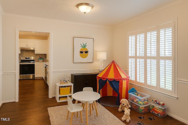 112 W Skyhawk Dr, Cary, NC 27519 - playroom with dark wood-style flooring, healthy amount of natural light, and ornamental molding