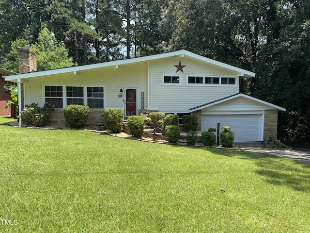 100 Hillcrest Dr, Smithfield, NC 27577 - tri-level home with a chimney, a front lawn, an attached garage, and stone siding