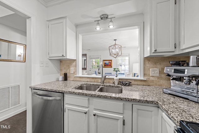 1300 Dylan Heath Ct, Raleigh, NC 27608 - kitchen featuring dishwasher, decorative backsplash, crown molding, white cabinets, and a chandelier