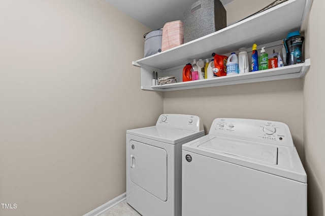 1300 Dylan Heath Ct, Raleigh, NC 27608 - washroom with washing machine and clothes dryer and baseboards