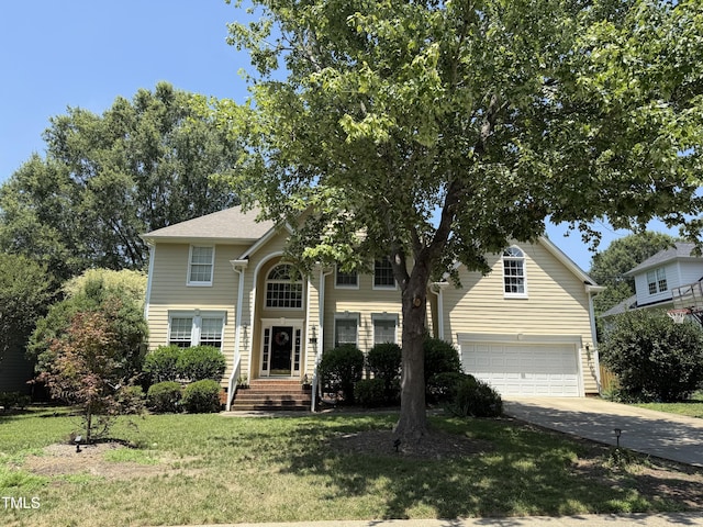 102 Shadow Ridge Pl, Chapel Hill, NC 27516 - view of front of home with a garage, driveway, and a front lawn