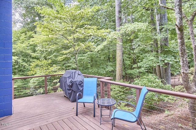 1026 Highland Woods Rd, Chapel Hill, NC 27517 - wooden terrace with a grill and a view of trees