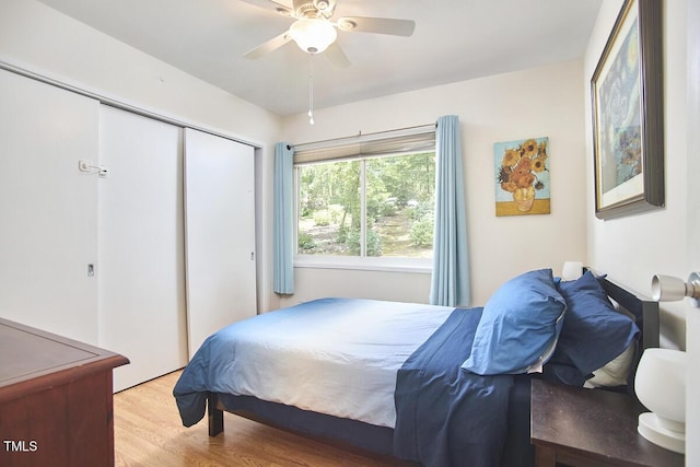 1026 Highland Woods Rd, Chapel Hill, NC 27517 - bedroom featuring a closet, wood finished floors, and a ceiling fan