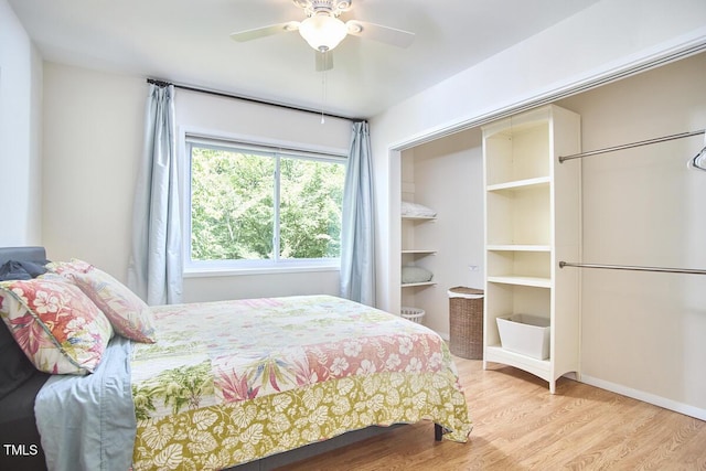 1026 Highland Woods Rd, Chapel Hill, NC 27517 - bedroom featuring wood finished floors and a ceiling fan