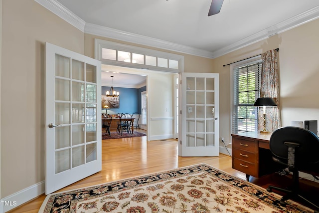 1224 Marshall Farm St, Wake Forest, NC 27587 - home office with french doors, light wood-type flooring, crown molding, ceiling fan, and a chandelier